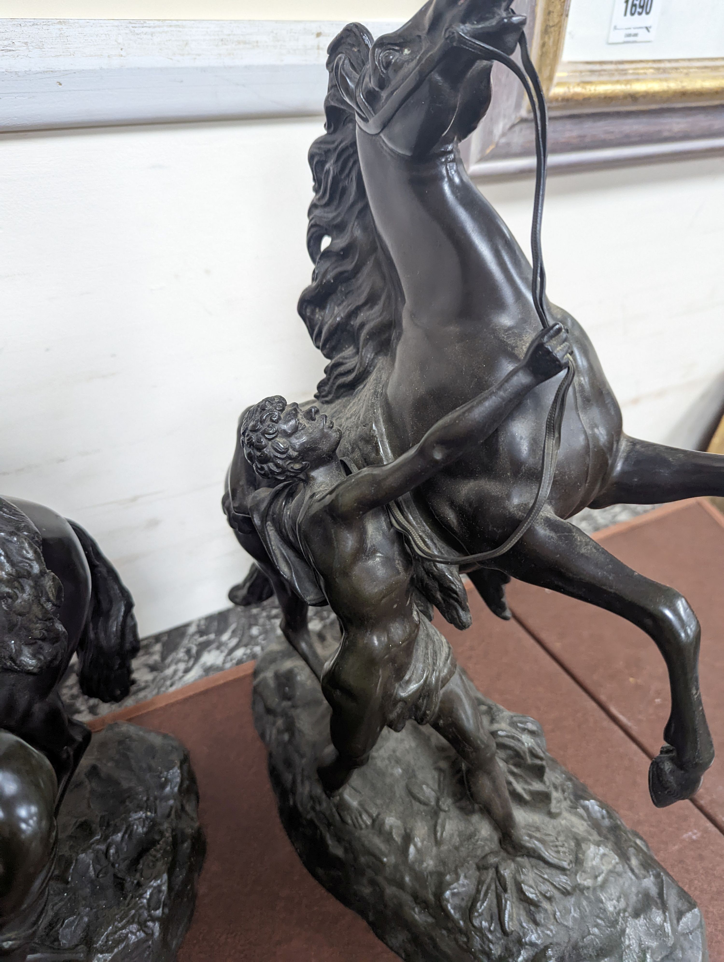 After Coustou, a pair of bronze Marly horses 41cm